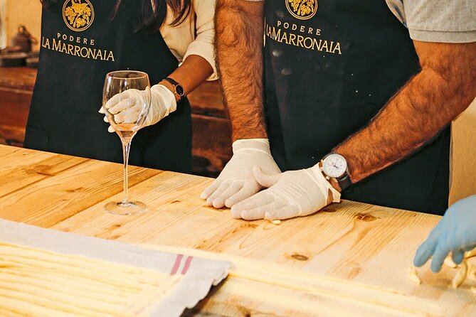 3-hour Tuscan Cooking Class with Wine & Oil Tasting - Wine, olive oil, and balsamic at the table