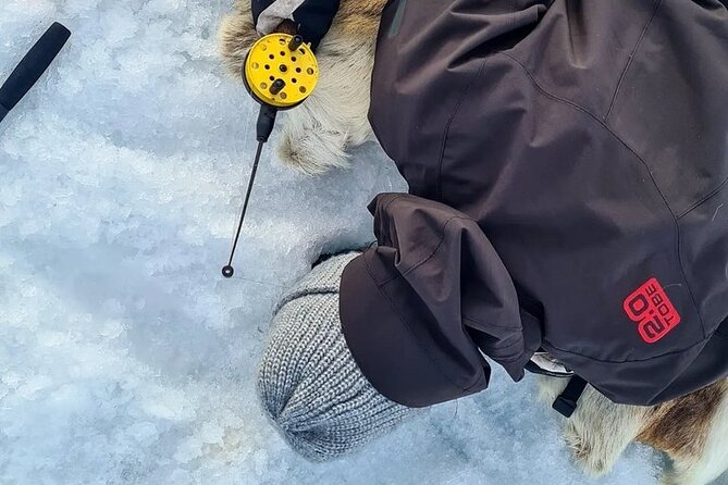 Arctic Fishing & Open Fire Cooking - Drilling into the ice the Lappish way
