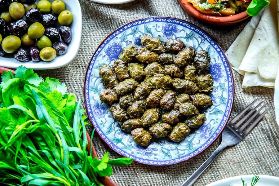 Azerbaijani Cooking Class & Old City Tour & Lunch - Making dolma, qutab, and mint ayran