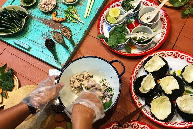 Baipai Thai Cooking School: Authentic Cooking Class Tour - Cooking Thai food in a peaceful garden setting