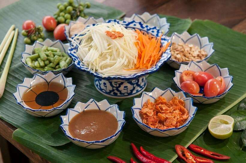 Bangkok: Hands-on Thai Cooking Class and Market Tour - The daily menu changes your meal