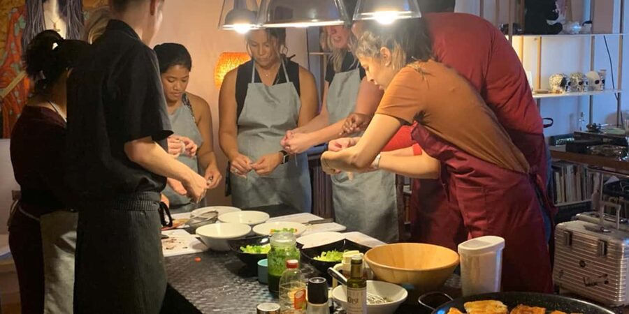 Barcelona Authentic Paella and Sangria Cooking Class - Mixing sangria and learning the local logic