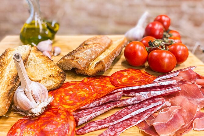 Barcelona Paella Cooking Class & Boqueria & Hofmann-Trained Chefs - Pan con tomate, jamón, and cava