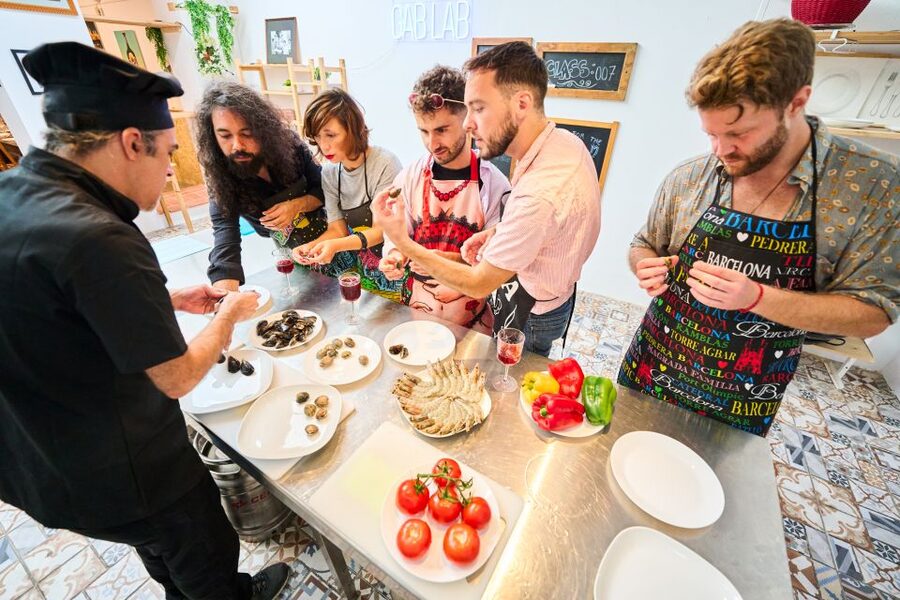 Barcelona: Paella Cooking Class with Market Visit and More - Dessert and the long communal meal
