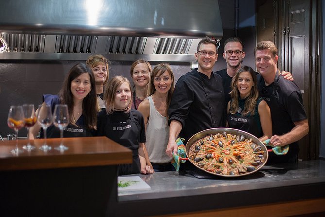 Barcelona : Paella Cooking Experience + Boqueria Market Exclusive Tour - Cooking paella with the group