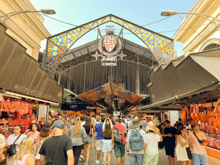 Barcelona: Seafood Paella Cooking Class & Boqueria market - Moving from the market to the cooking table