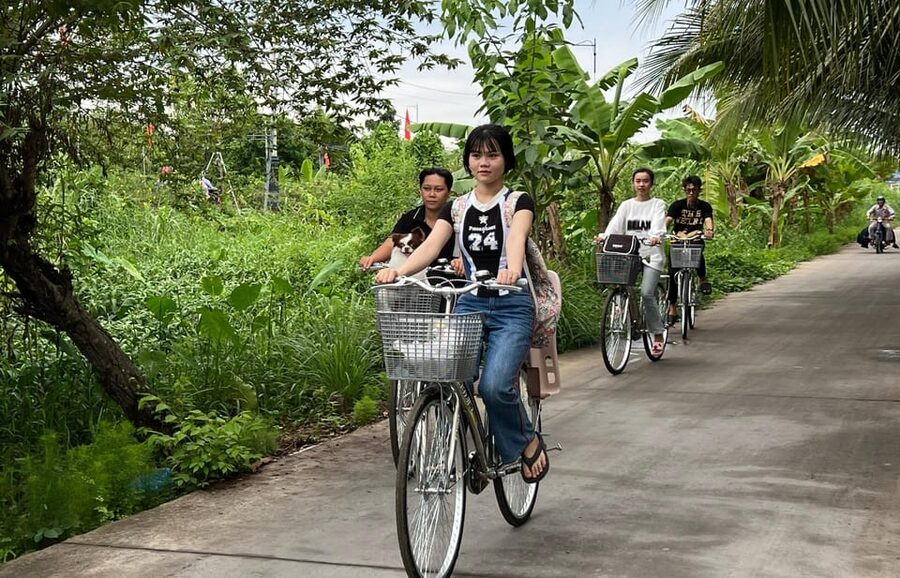 Biking and cooking class in the rural tour at Can Tho - Lotus tea in the garden