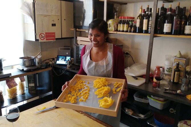 Bolognese Cooking Class in a Unique Central Location - Rolling tagliatelle by hand