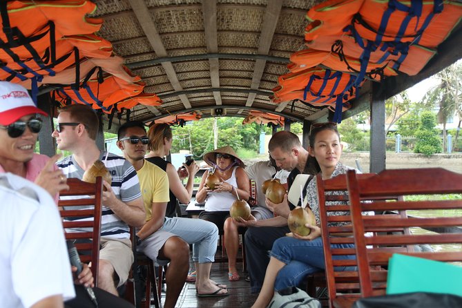 Cai Be Mekong Delta Tour: Cooking Class, Cycling & Craft Villages - Boat travel and the return to Ho Chi Minh City