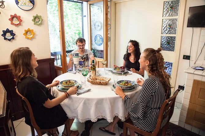 Cesarine: Market Tour & Home Cooking Class in Bari - Sitting down to a three-course Bari lunch