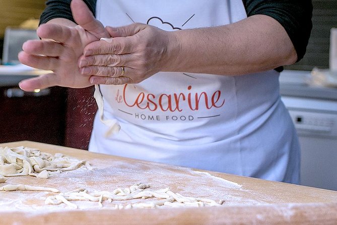Cesarine: Market Tour & Home Cooking Class in Catania - Moving from shopping to the home kitchen