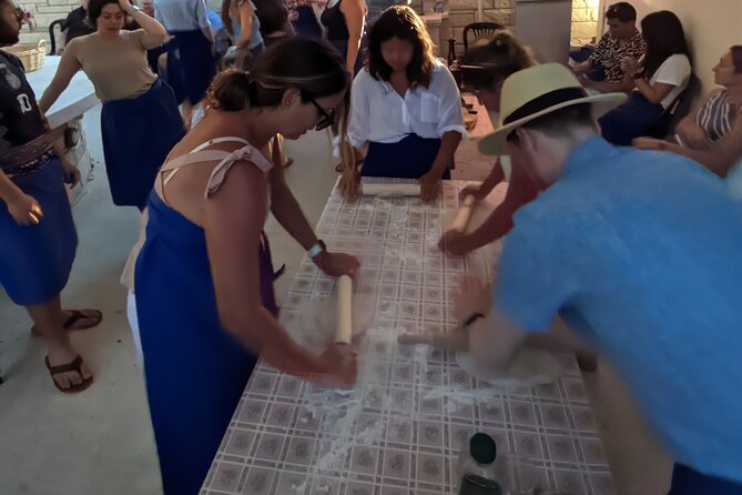 Chania Cooking Class-The Authentic Enjoy traditional Cretan meal - Rolling dough for savory and sweet kalitsounia