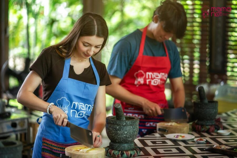Chiang Mai: Cooking Class with Organic Farm at Mama Noi - Sitting down to eat your own Thai dinner