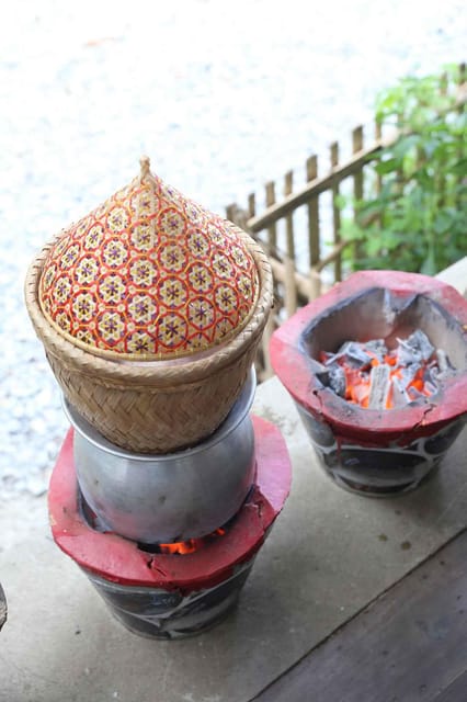 Chiang Mai : Traditional Northern Cooking Class - Mixing pork chili sauce and balancing heat