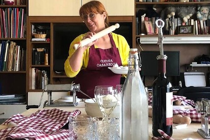 Colorful Pasta Tagliatelle and Ravioli Cooking Class near Arezzo - Bruschetta, garden herbs, and the meal at the table