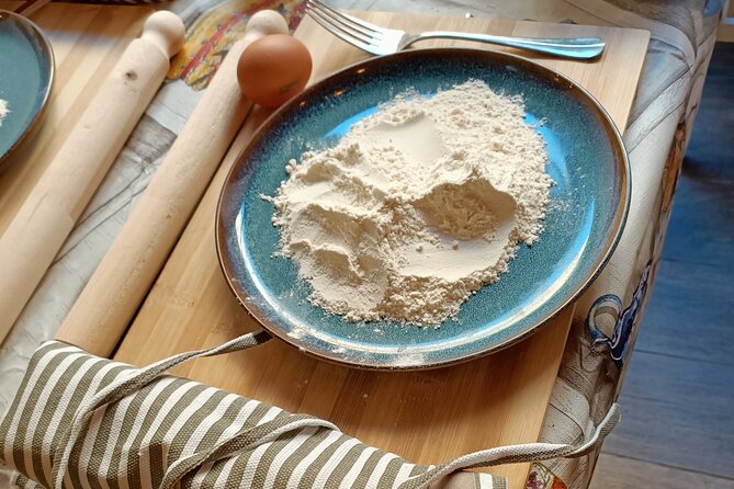 Cooking Class in Rome: Make Fettucine & Tiramisù with Chef Paolo - Making pasta from flour and egg in central Rome
