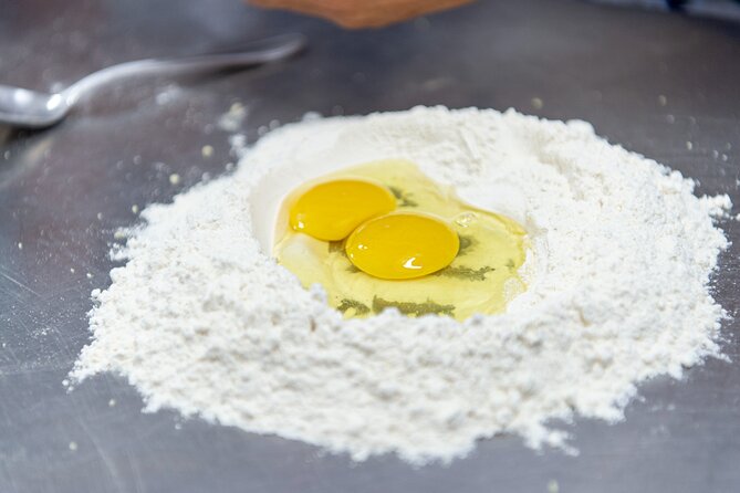 Cooking class: Pasta & Tiramisù with lunch in Amalfi Coast! - Making bruschetta before the pasta work begins