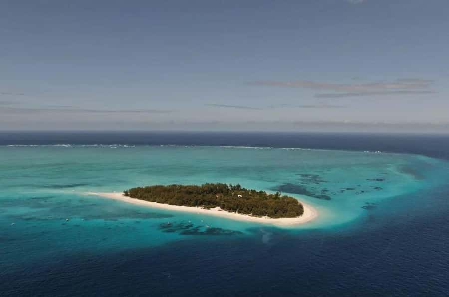 Cooking Class Tour, Stone Town Tour, Horseback Riding - Seeing Mnemba Island Atoll from a private boat