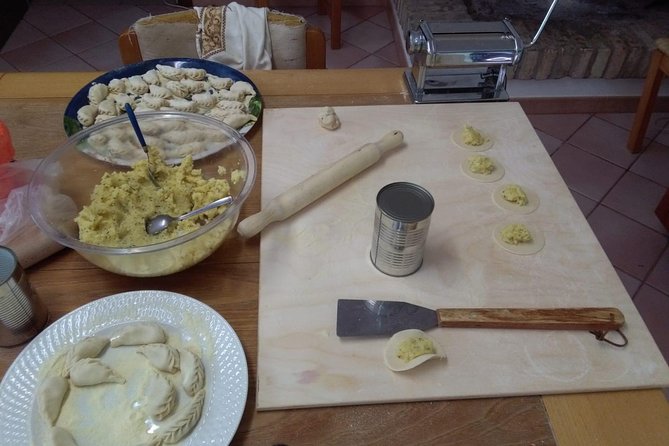 Culurgiones Cooking Class Cagliari - Sitting down to a Sardinian lunch