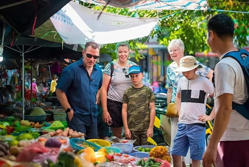 Da Nang/Hoi An: Market Tour, Basket Boat Ride, Cooking Class - Riding a round bamboo boat through Cam Thanh