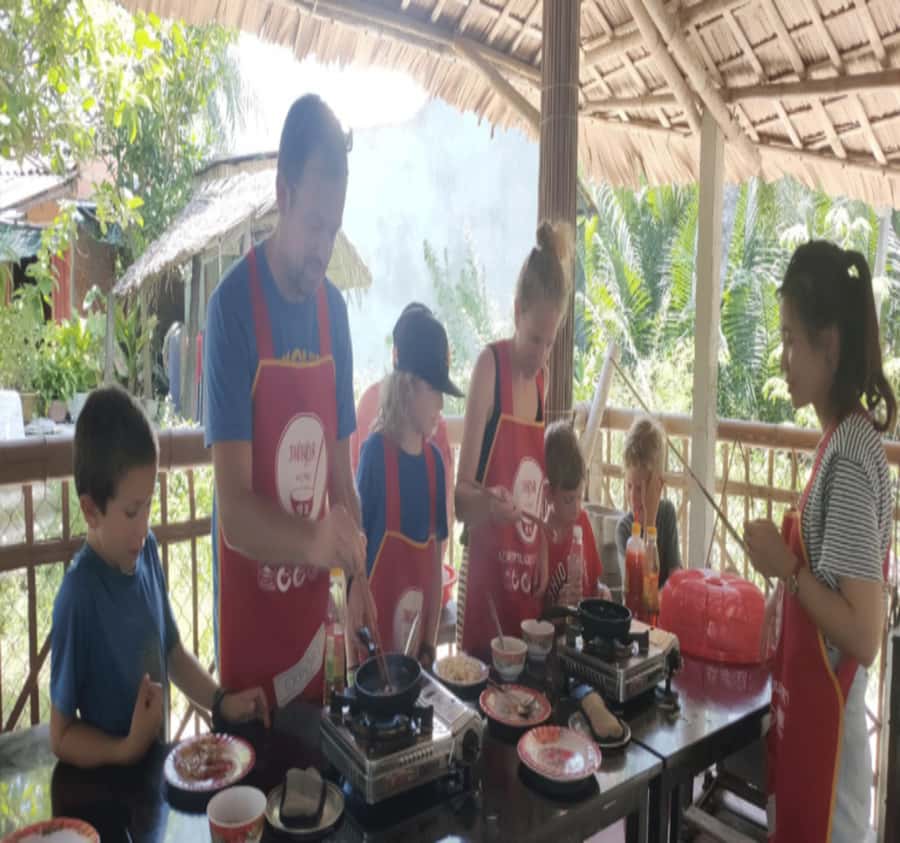 Da Nang: Traditional Cooking Class and Pho with Local Girl - Sitting down to eat what you made