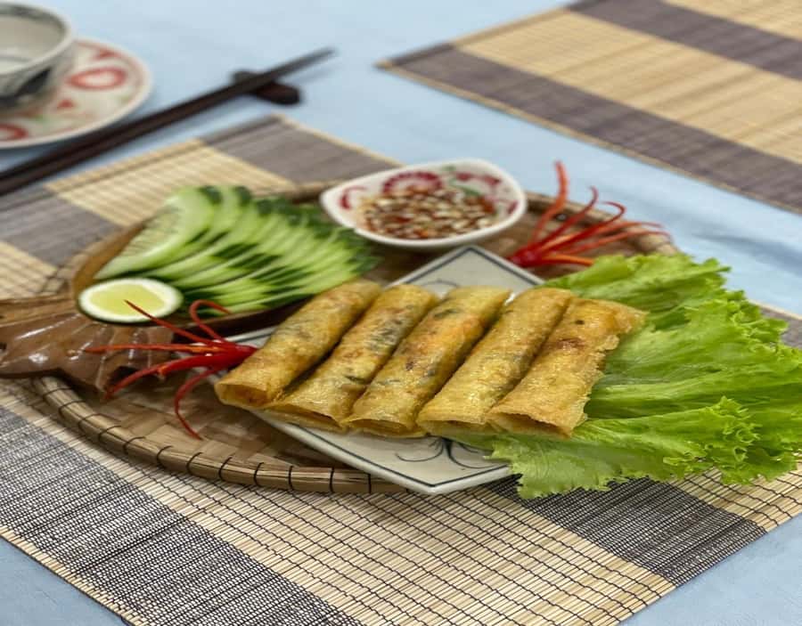 Da Nang: Vegetarian Cooking Class with Janny - Sitting down to eat what you prepared