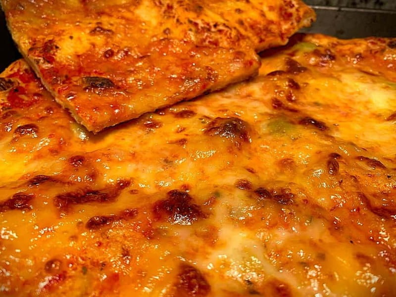 Family-Style Italian Pizza Cooking Class & Dining Experience - Baking, eating, and tasting the wines