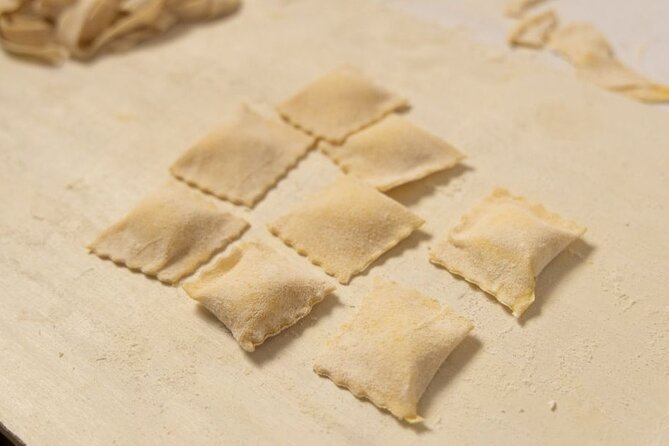 Fettuccine Ravioli and Tiramisu Cooking Class in Rome - Sitting down to eat your own work