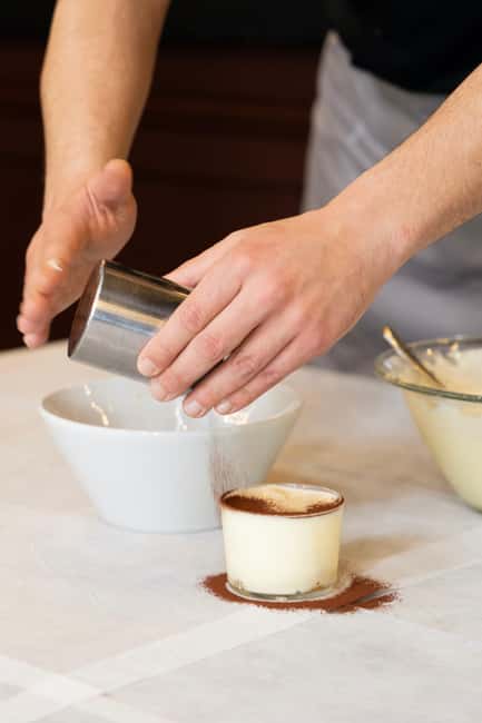 Fettuccine, Ravioli & Tiramisu Cooking Class in Rome - Sitting down for the Italian meal