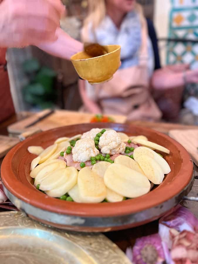 Fez: Souk Tour and Traditional Home Cooking Class - From chopping vegetables to shaping pastilla