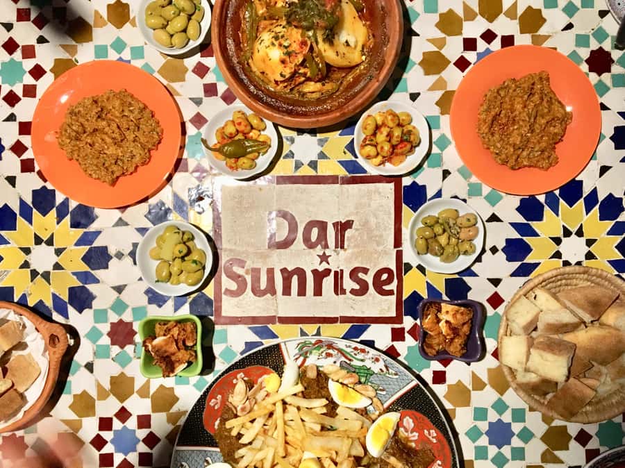 Fez: Souk Tour and Traditional Home Cooking Class - Mint tea and menu planning at Dar Sunrise