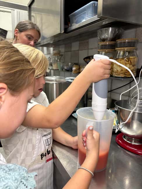 Florence: Pizza and Gelato Cooking Class - Sitting down to eat what you made