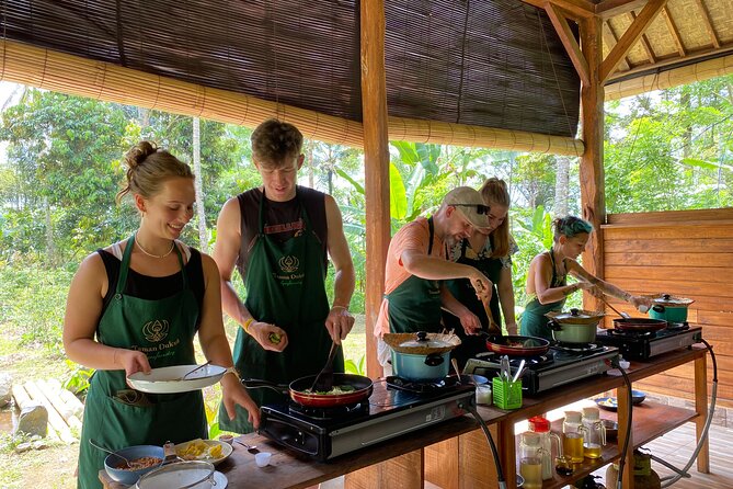 From Ubud: Authentic Bali Farm Cooking School & Organic Farm - Picking vegetables in an 8,000-square-meter organic farm