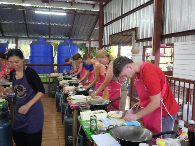 Full Day Thai Cooking Class in Organic Farm and Market - Preparing five to six dishes by hand