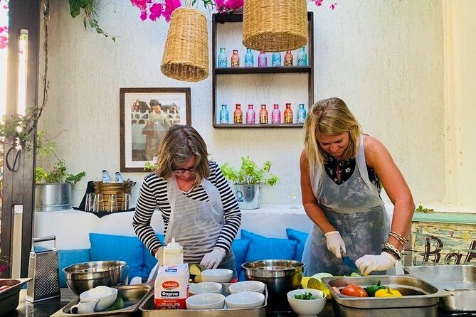 Greek Cuisine Cooking Class in Santorini with Recipes and Wine - Cooking Greek food in Megalochori