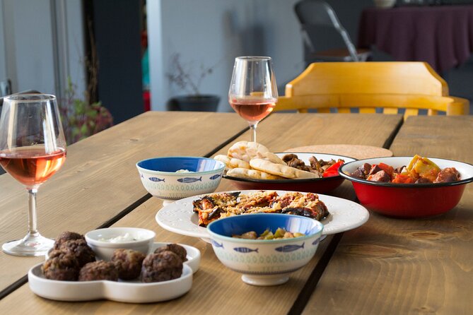 Greek Meze Cooking class and dinner with an Acropolis view - The opening conversation sets up the meal