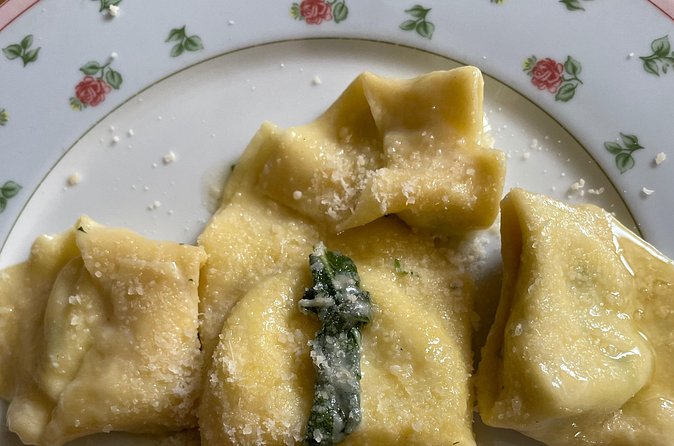 Handmade Pasta making Class with Chef Antonio - Sitting down with wine and your finished food