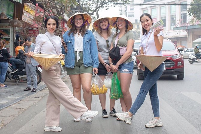 Hanoi Maya Kitchen: Traditional Cooking Class & Market Tour - Making spring rolls by hand