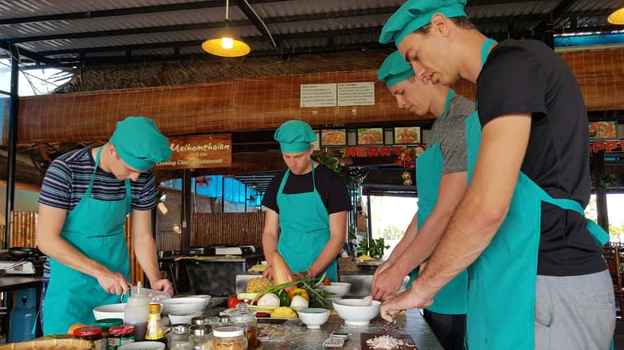 Hoi An Cooking Class With Market and Bamboo Basket Boat Tour - A garden cooking school with a relaxed setting
