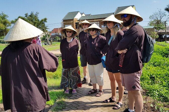Hoi An Cooking Class With Market Tour and Bamboo Basket Boat Ride - A round bamboo boat through Bay Mau Coconut Village
