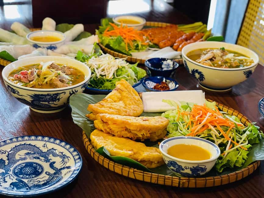 Hue City: Cyclo, Market Tour & Cooking Class at Madam Thu - Starting with a cyclo and the Perfume River