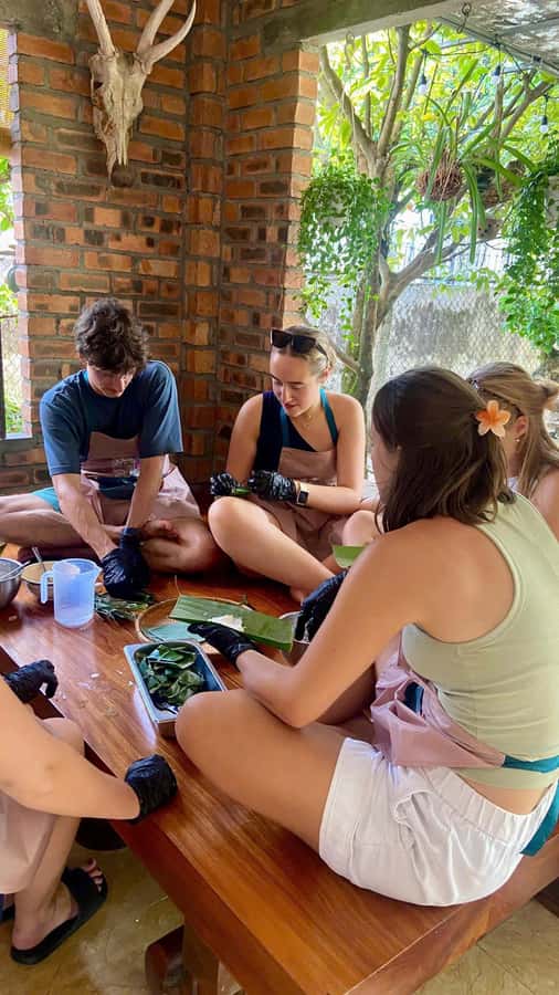 Hue: Traditional Vietnamese Cooking Class - Sitting down to eat what you made