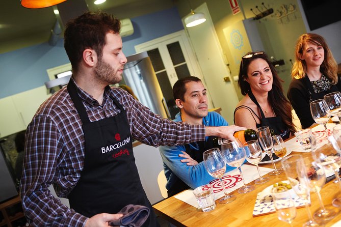 Interactive Paella & Market: Bottomless Wine & Rambla Views - Cooking in a Kitchen Above La Rambla