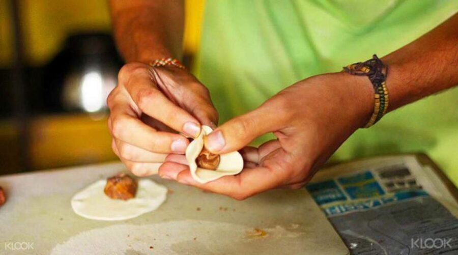 Kathmandu: Nepali Cooking Class with Hotel Pickup - What the English-speaking chef teaches