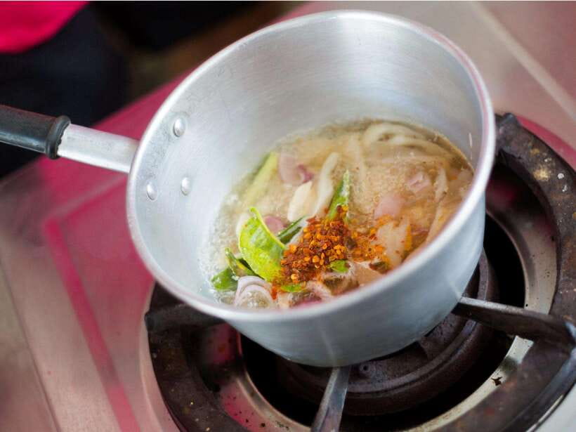 Khao Sok: Private Authentic Jungle Cooking Experience - Picking herbs where the cooking starts
