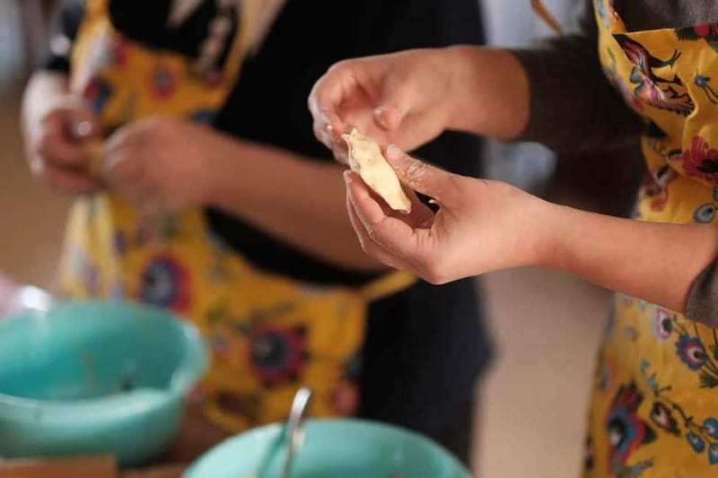 Krakow Pierogi Cooking Class - Sitting down with a local drink