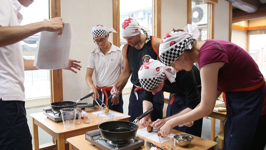 Kyoto: Ramen Cooking Class at a Ramen Factory with Souvenir - Seasoning chicken for a fast, satisfying bowl