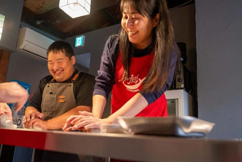 Kyoto Udon & Tempura Cooking Class with Professional Chefs - Eating what you made, with two drinks