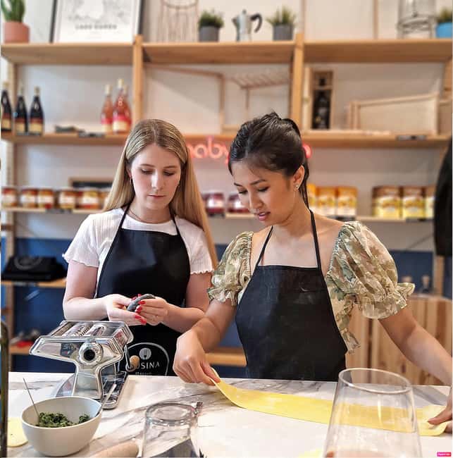 Lazise: Fresh Pasta and Tiramisù Cooking Class at Lake Garda - Sitting down to eat your own work