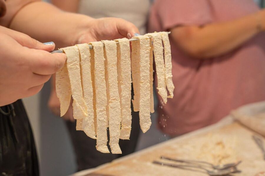 Learn and taste the real bolognese ragù and pasta making - Mixing dough and shaping handmade pasta